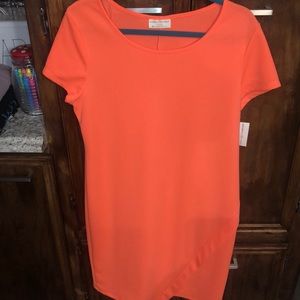 Bright orange colored dress